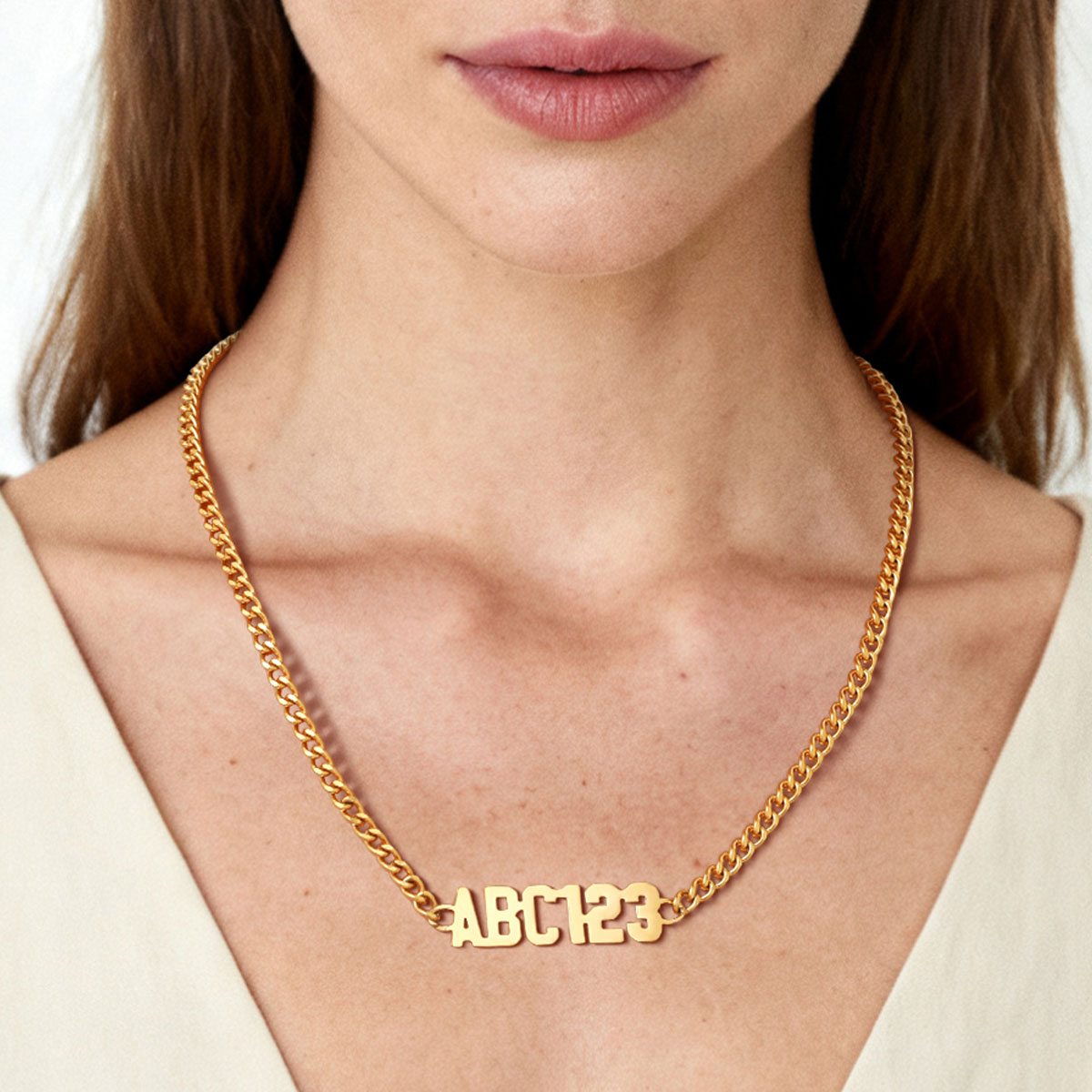 A Woman Wearing Name Cuban Chain Necklace 