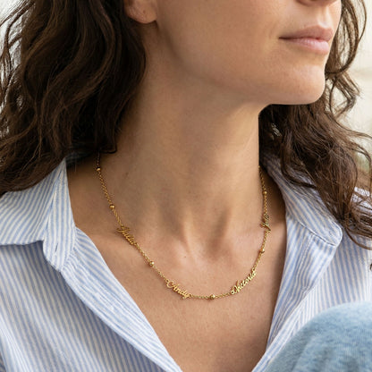 A Woman Wearing Personalized 3 Nameplate Necklace for Women