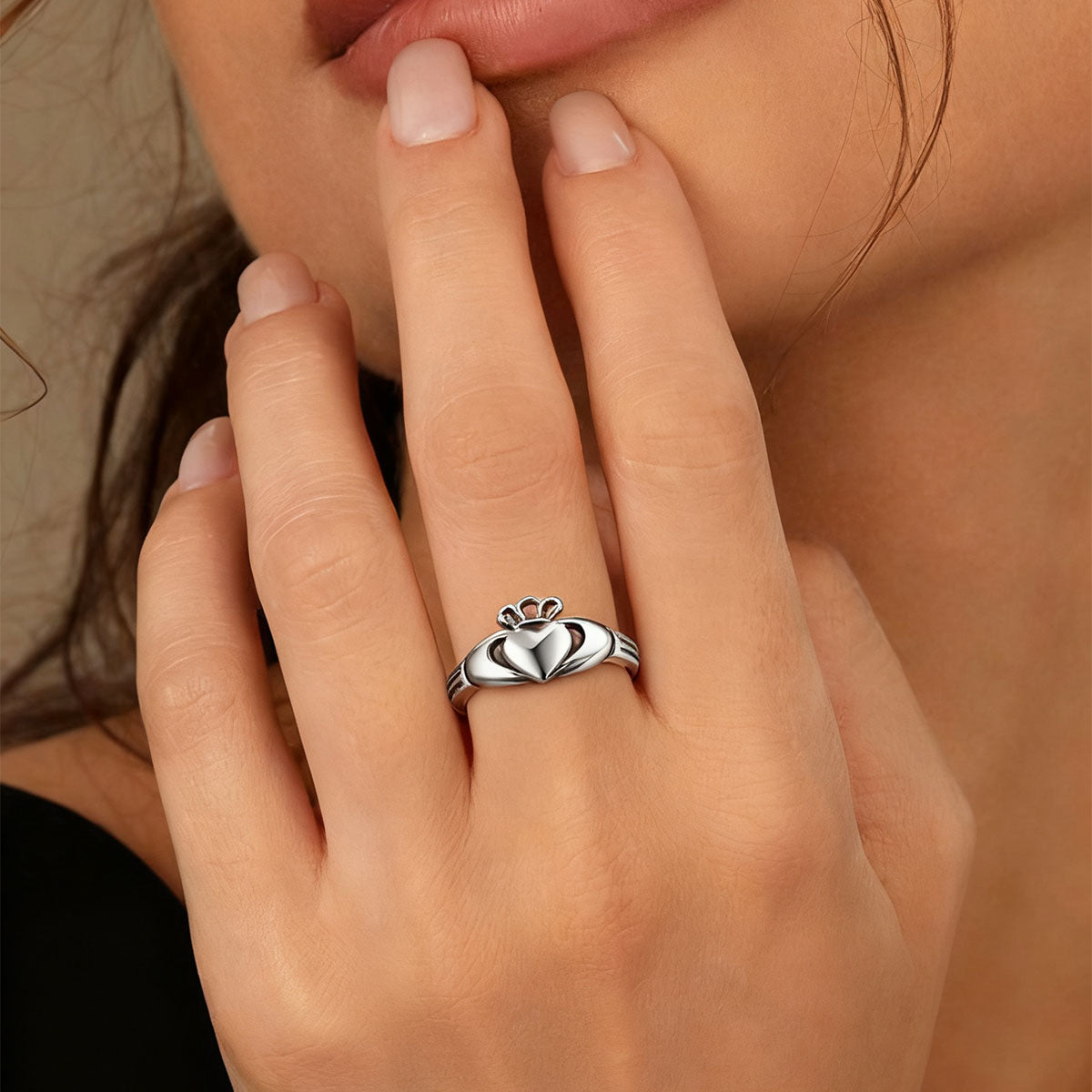 A Woman Wearing Personalized Claddagh Promise Rings