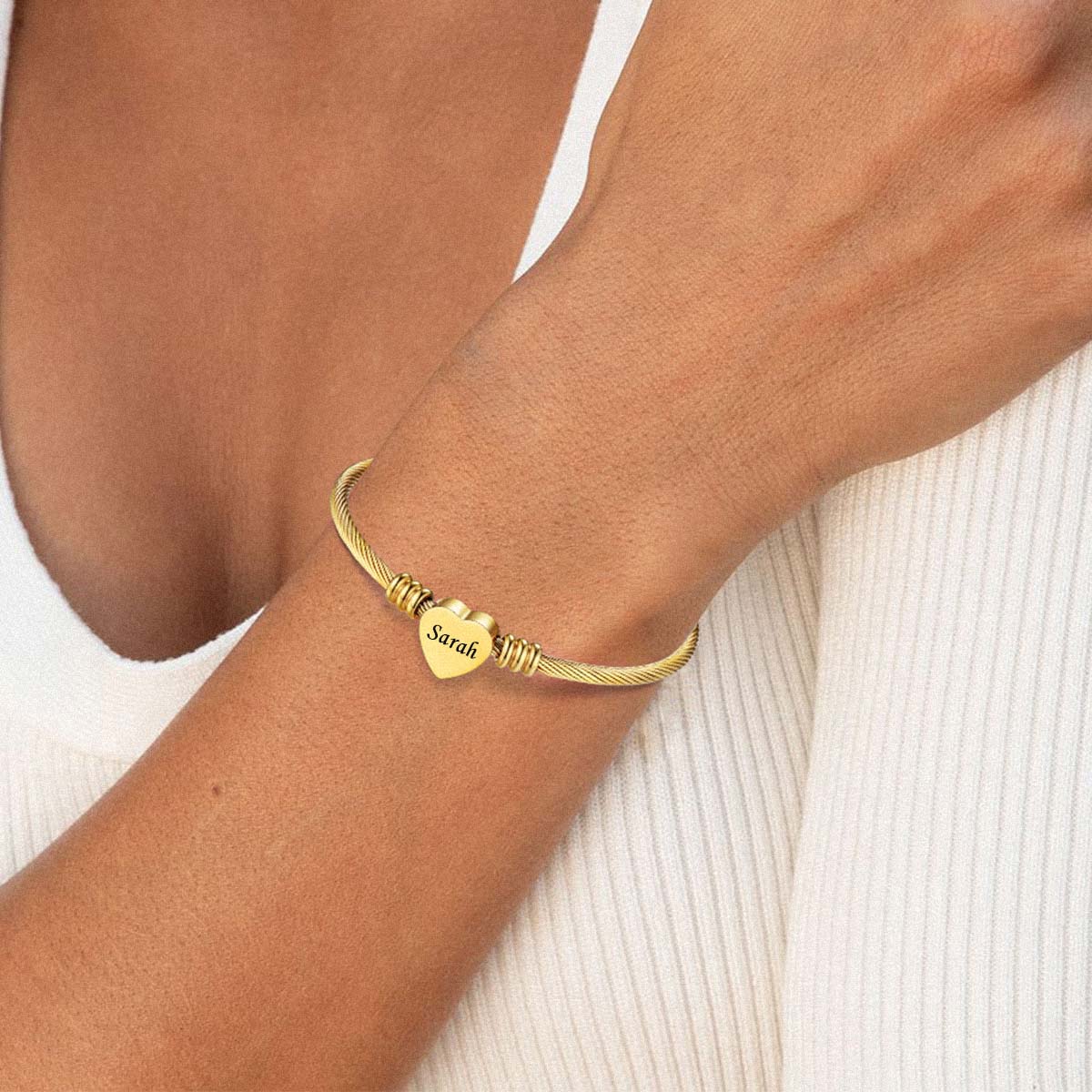 A Woman Wearing Personalized Heart Charm Cuff Bracelet