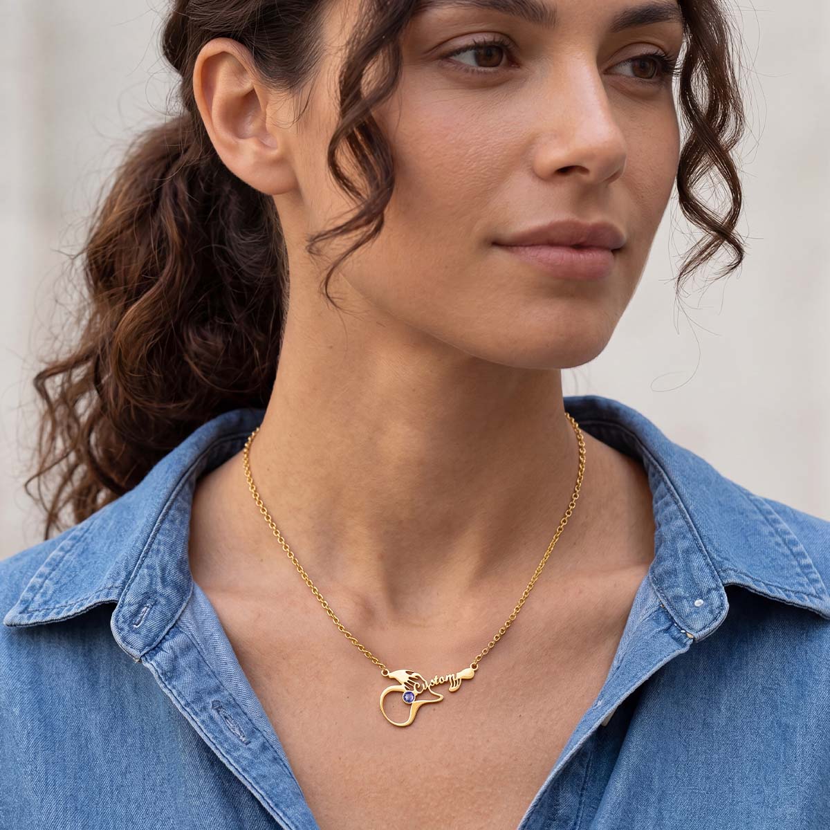 A Woman Wearing Personalized Name Guitar Necklace with Birthstone
