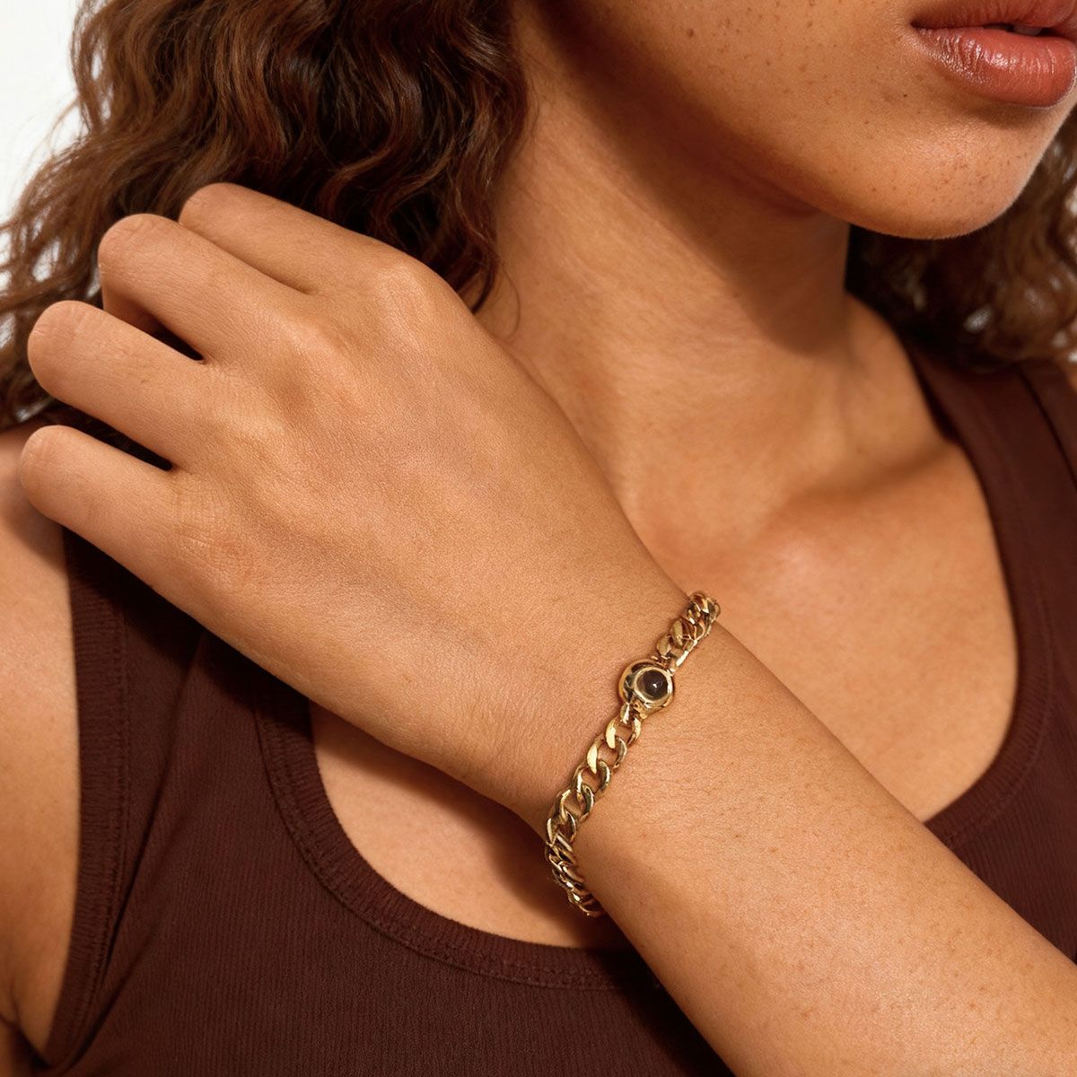A Woman Wearing Photo Projection Bracelet Cuban Chain Bracelet