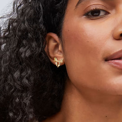 A Woman Wearing Ribbon Bow Stud Earrings
