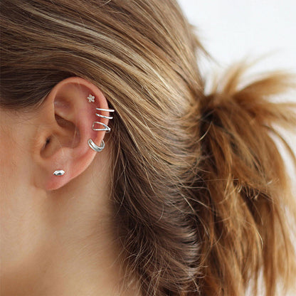 A Woman Wearing Silver Ear Cuff Earrings Set Non Piercing