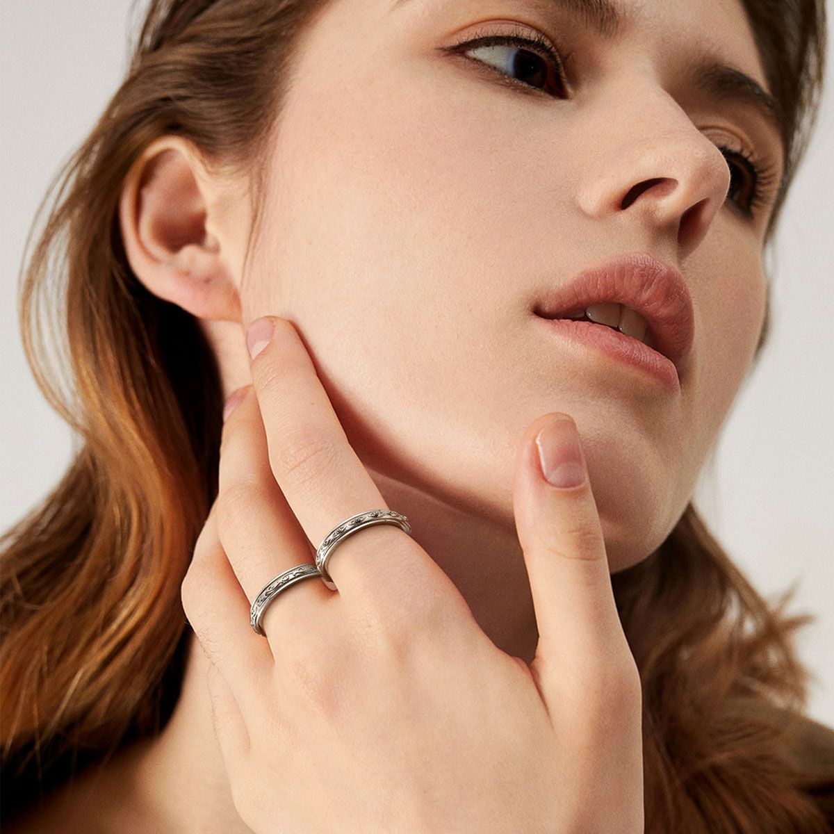 A Woman Wearing Silver Evil Eye Anxiety Fidget Ring