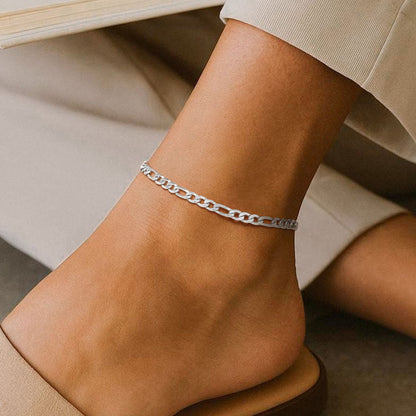 A Woman Wearing Stainless Steel Figaro Chain Anklet 5MM