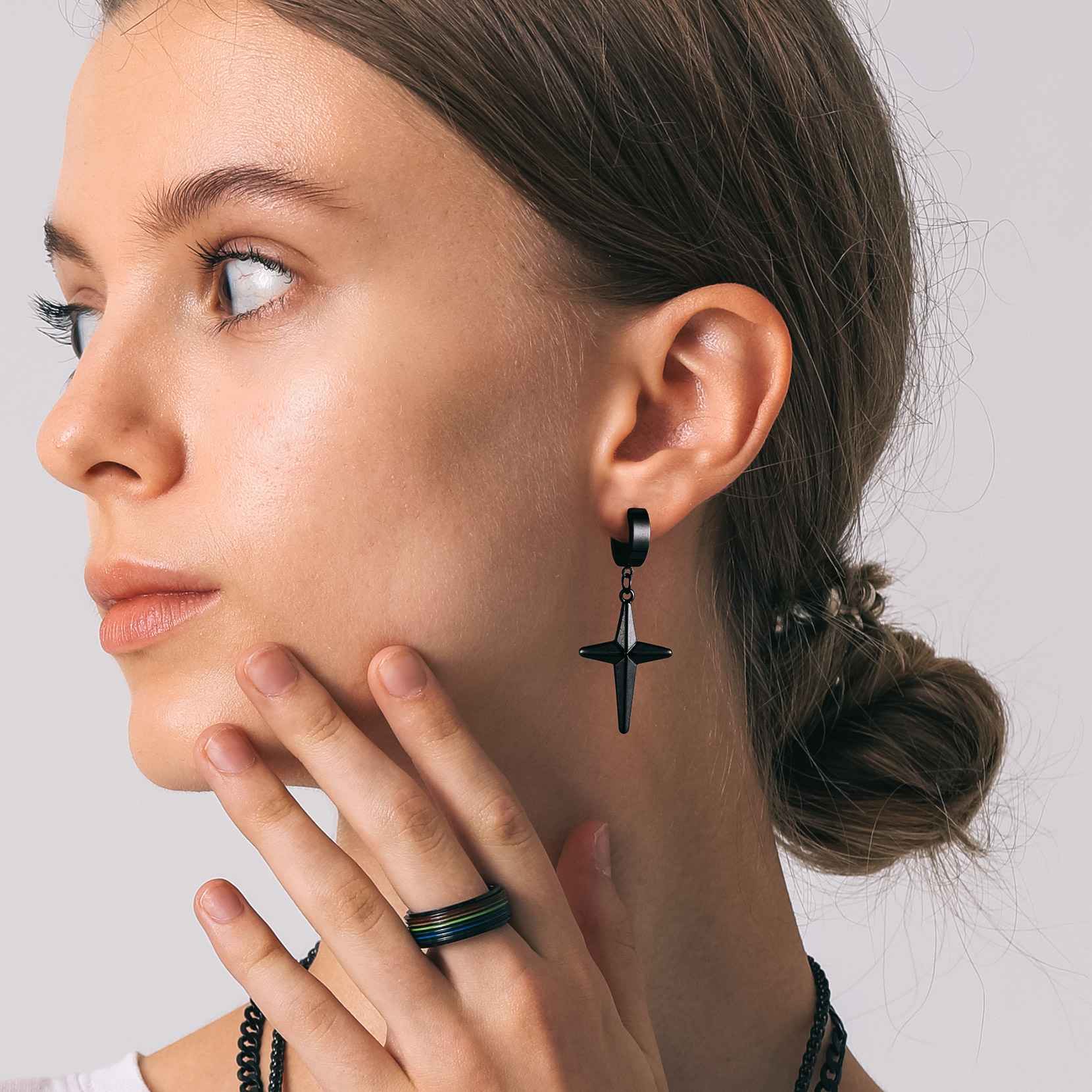 A Woman Wearing Star Hoop Dangle Drop Earrings