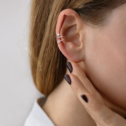 A Woman Wearing Star Moon Ear Cuff Earrings Non Piercing