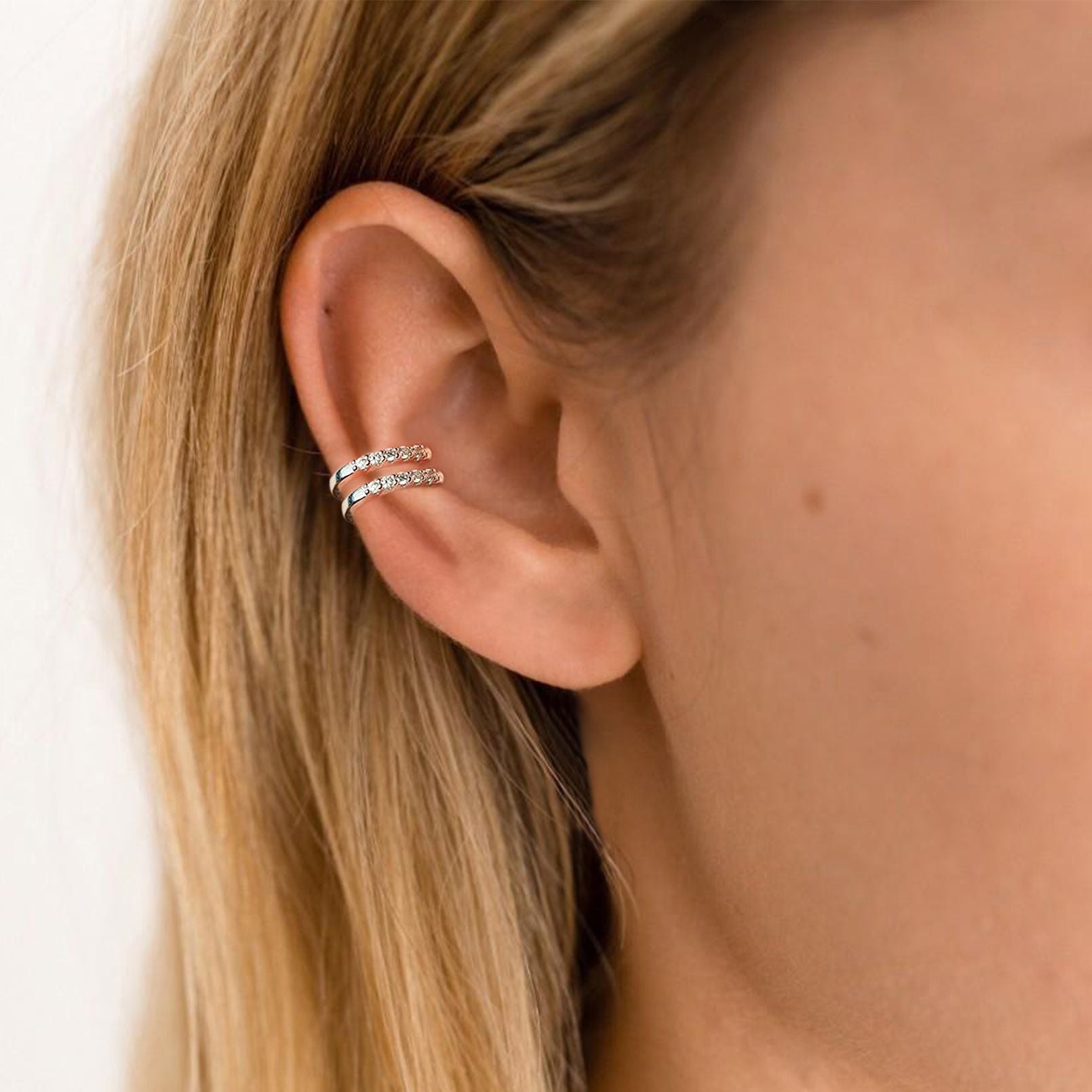 A Woman Wearing Sterling Silver Cubic Zirconia Ear Cuff Earrings Clip on Earrings