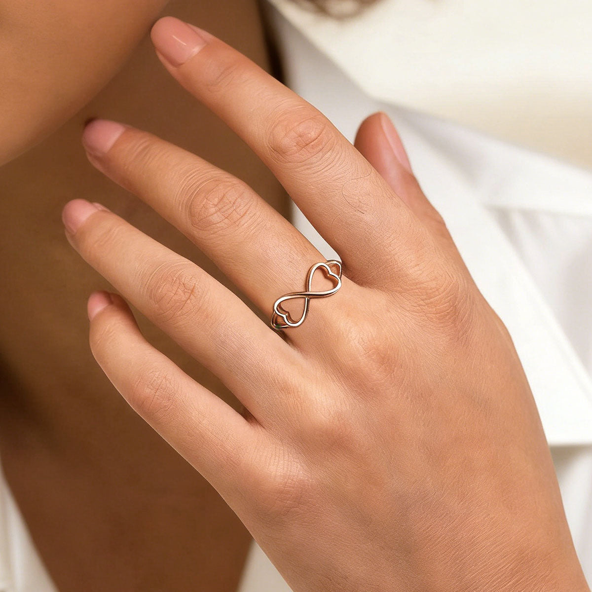 A Woman Wearing Sterling Silver Heart Infinity Promise Ring