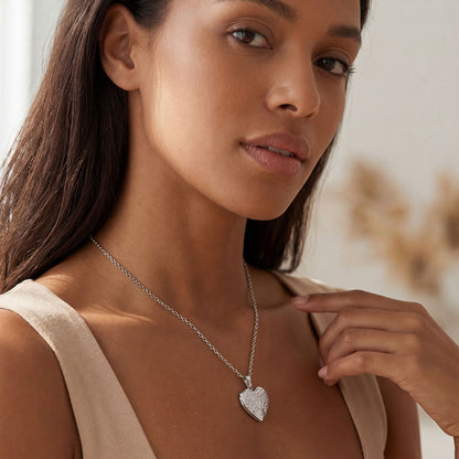 A Woman Wearing Tree of Life Hearts Locket Necklace with Pictures