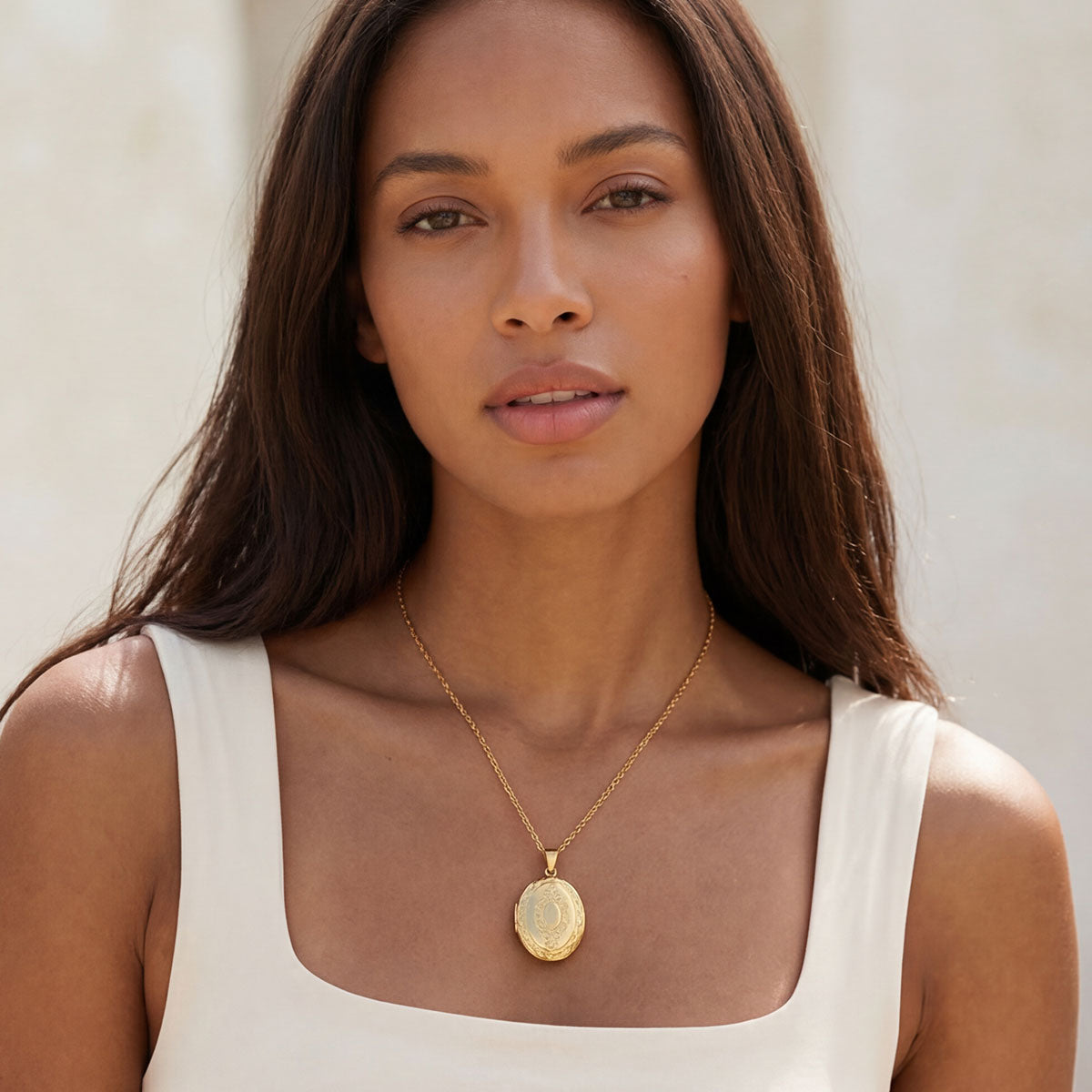 A Woman Wearing Vintage Oval Photo Locket Necklace