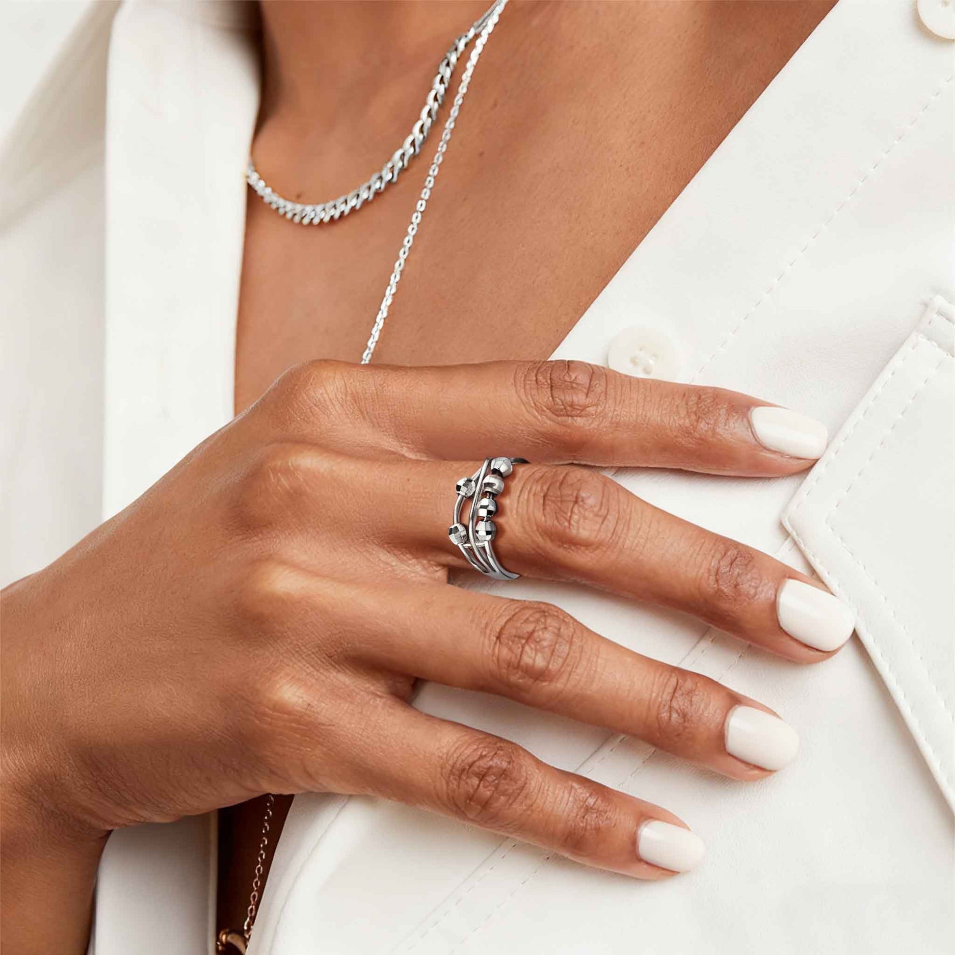 A Woman Wearnig 925 Sterling Silver Spinner Beads Anxiety Fidget Ring