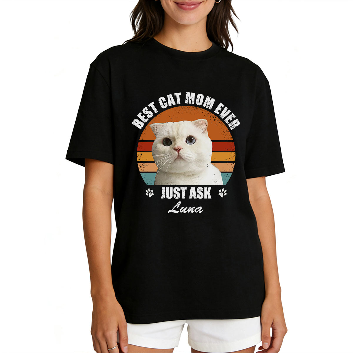 A Woman wearing a black custom pet t-shirt with a cat graphic and text.