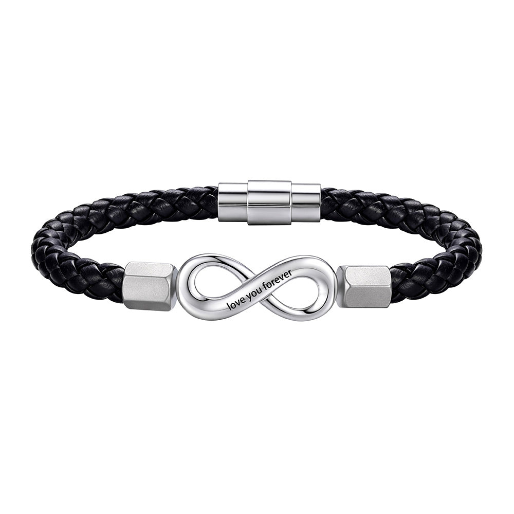 A black braided leather infinity bracelet with a polished silver infinity symbol centerpiece engraved with 'love you forever', flanked by two silver square beads, on a plain white background.