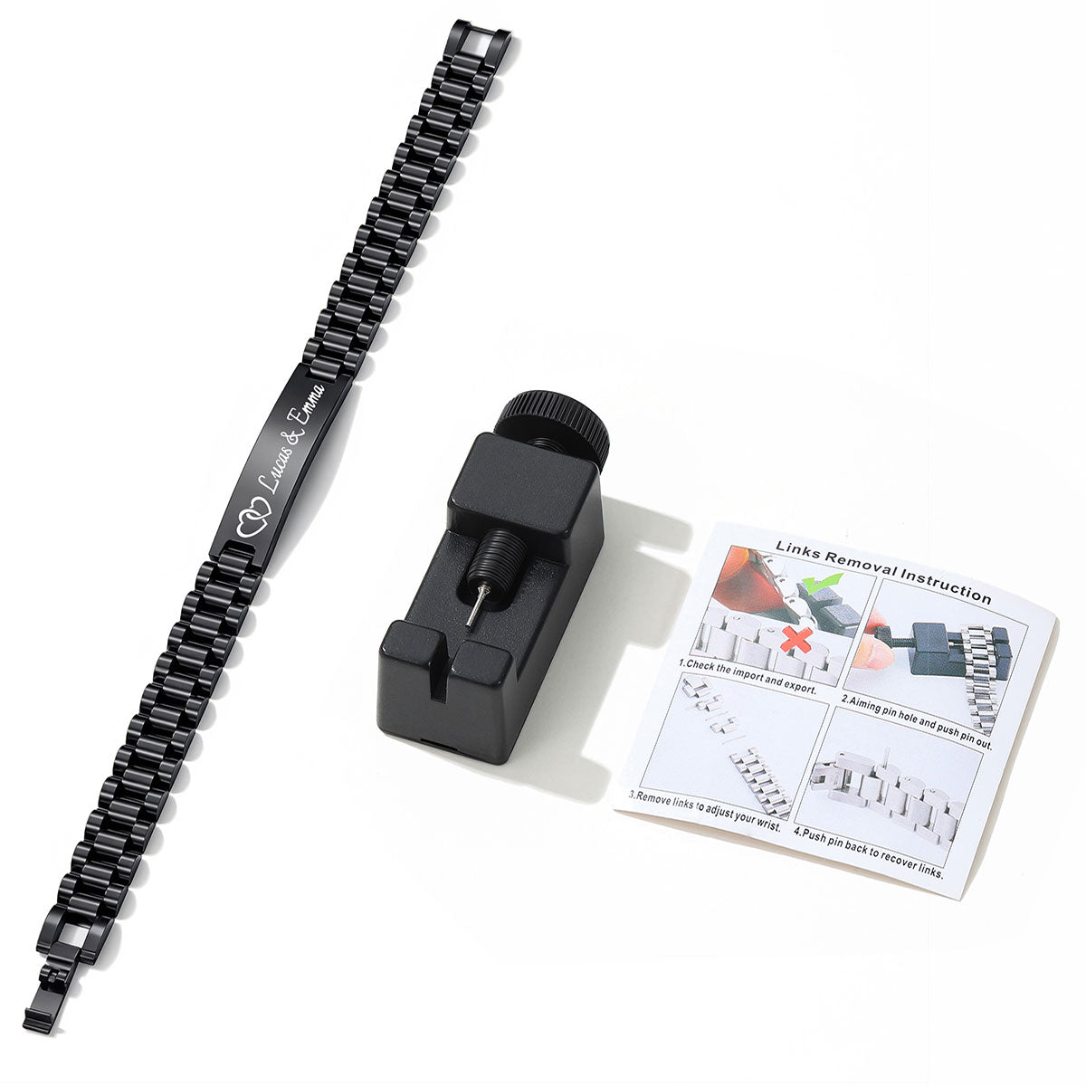 A black metal link medical alert bracelet shown with a black link remover tool and an instruction card on a white background. The band has white engraved text reading 'Living My Life' with a watch icon.