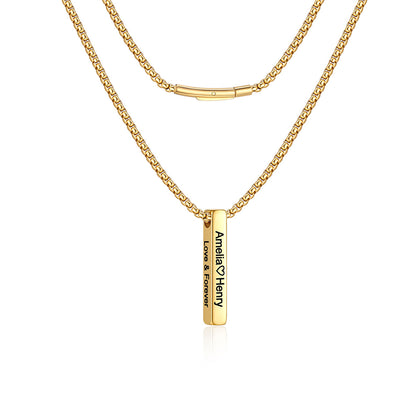 A gold-plated double-layer bar necklace featuring a classic curb chain and a vertical bar pendant engraved with the names 'Amelia & Henry' and 'LOVE & DEVOTION'.