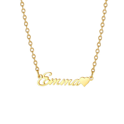 A gold name necklace featuring a personalized nameplate that reads 'Emma' in cursive script, with a small heart symbol at the end, shown on a plain white background.