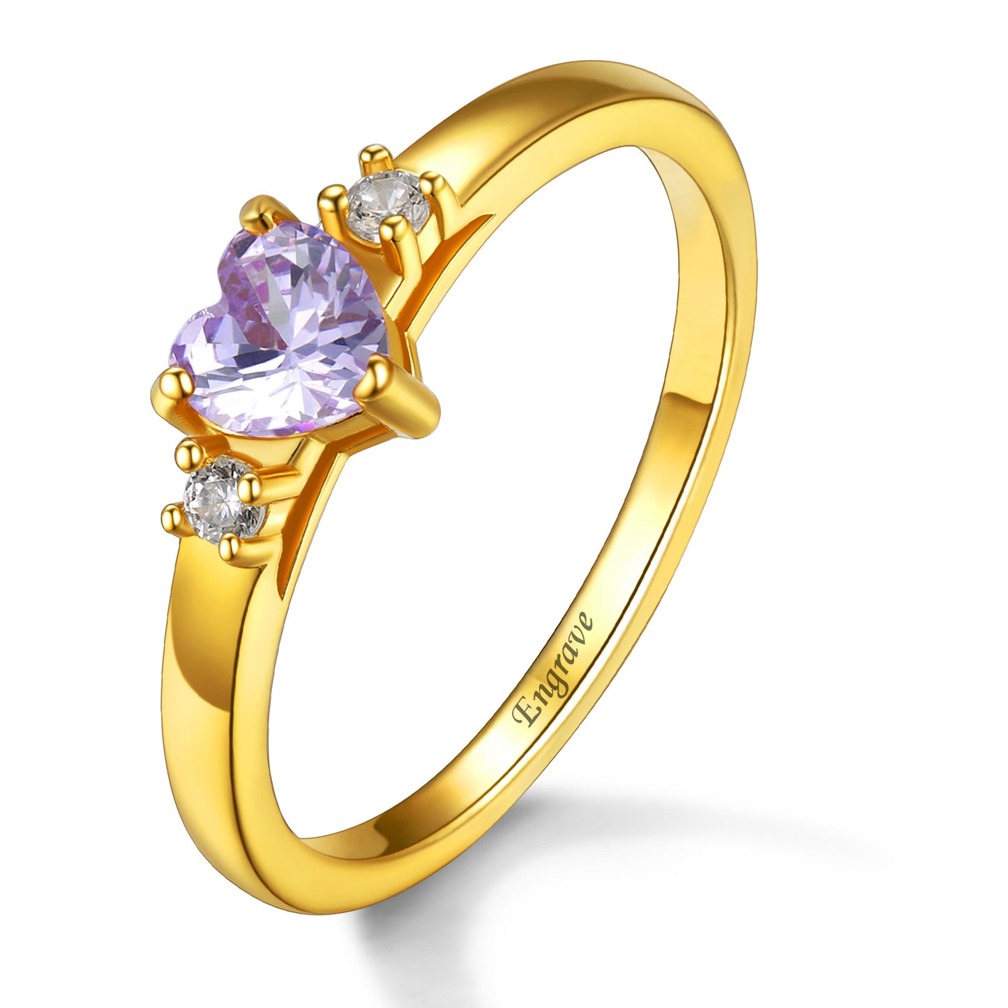 A gold personalized birthstone ring for women, featuring a heart-shaped purple stone and custom engraving on the band.