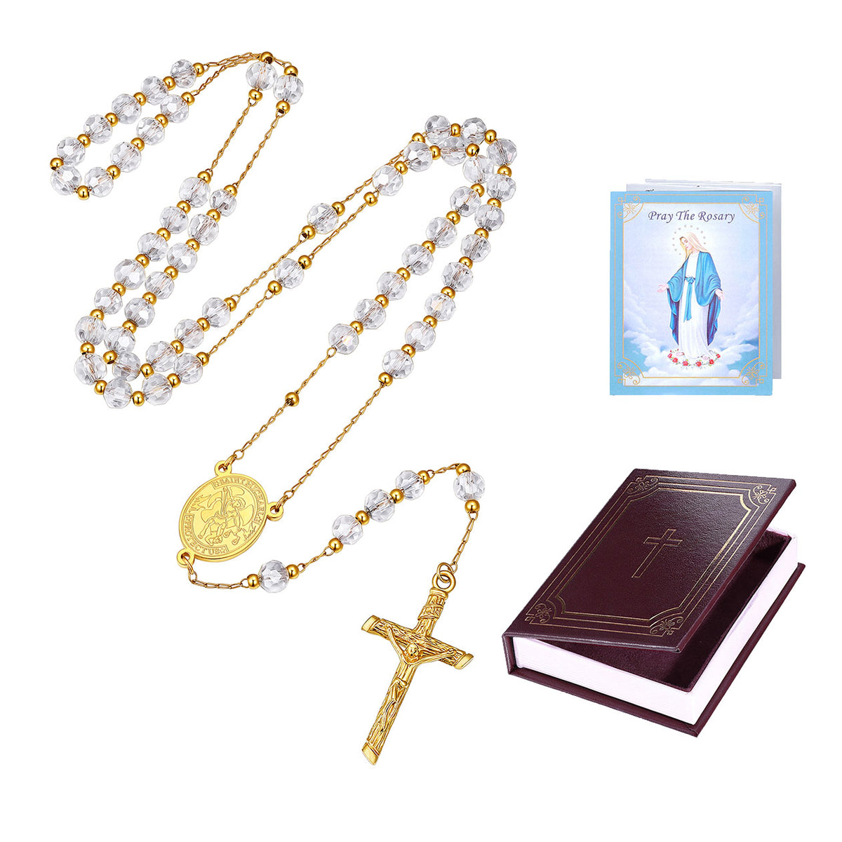 A rosary set on a white background, including a gold chain with clear faceted beads, a gold medallion and crucifix, a small prayer card, and a dark brown rosary book with a gold cross.
