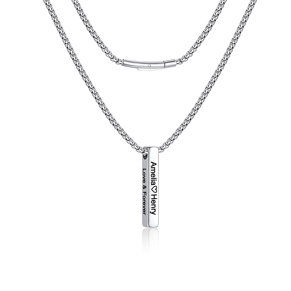 A silver-toned engraved bar necklace featuring a classic box chain and a flat rectangular pendant engraved with 'Annelie & Henry' and 'LOVE & FOREVER'.