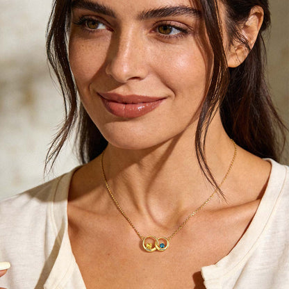 A woman Wearing Custom Name Family Birthstones Necklace