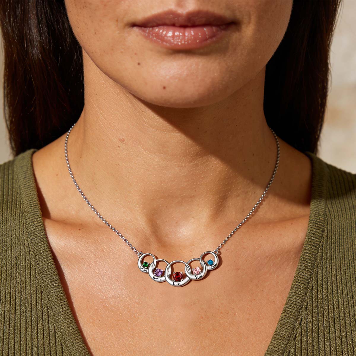 A woman Wearing Name Family Birthstones Necklace