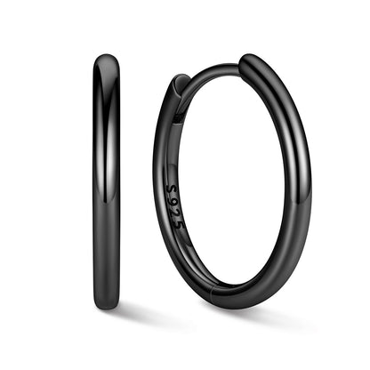 Black 14mm huggie earrings on a white background