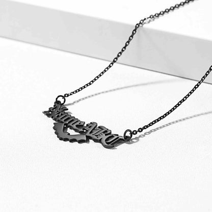 Black custom bat name necklace with a decorative pendant on a white background