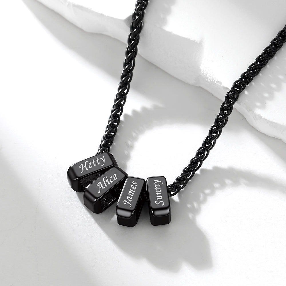 Black custom engraved name chain necklace  on a white surface