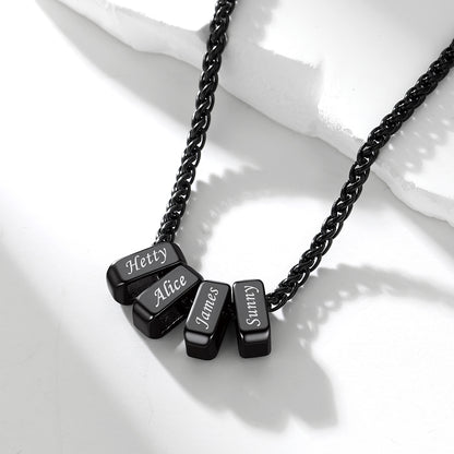 Black custom engraved name chain necklace  on a white surface
