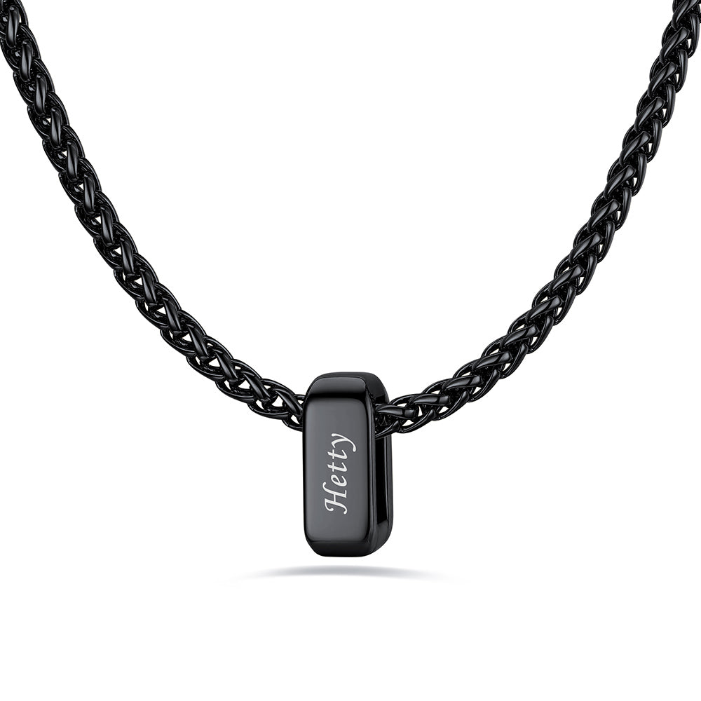 Black custom name necklace with 1 rectangular pendant engraved on a white background