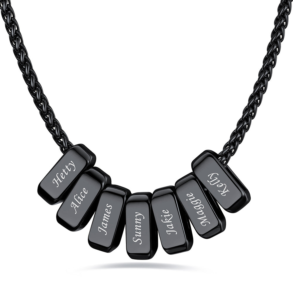 Black custom name necklace with 7 rectangular pendant engraved on a white background