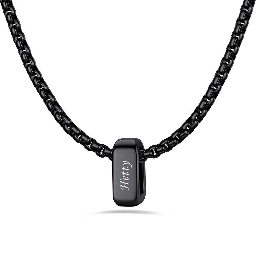 Black engraved name necklace with 1 name bars on a white background