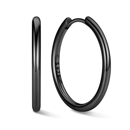 Black huggie 18mm earrings on a white background