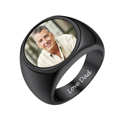 Black signet ring with a photo of a man and 'Love Dad' engraving on a white background