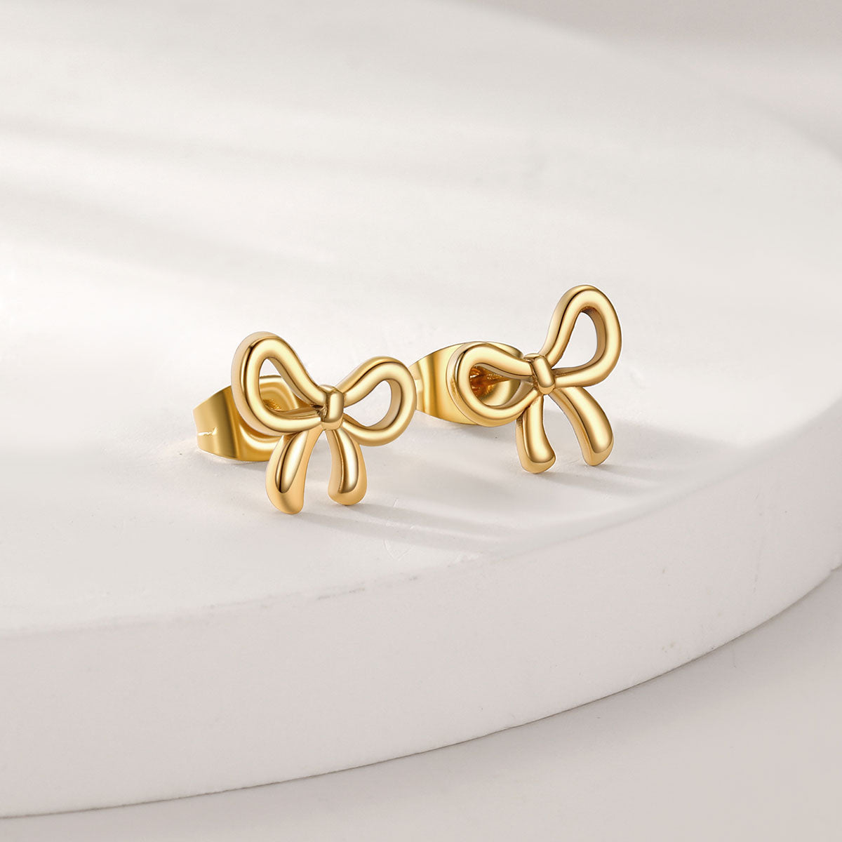 Bow Ribbon Studs Earrings in Gold Plated