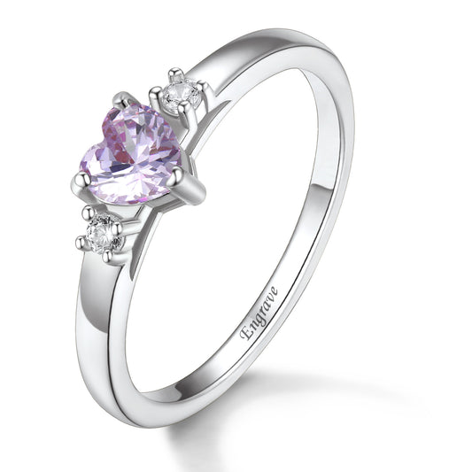 A 925 sterling silver personalized birthstone ring for women, featuring a heart-shaped purple stone and custom engraving on the band.