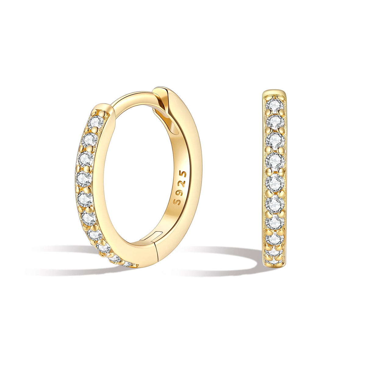 CZ Gold huggie earrings with diamond accents on a white background