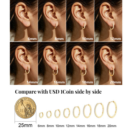 Comparison chart of gold cz huggie earrings in various sizes with a USD coin for scale.
