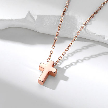 Cross necklace on a white background Rose Gold Plated