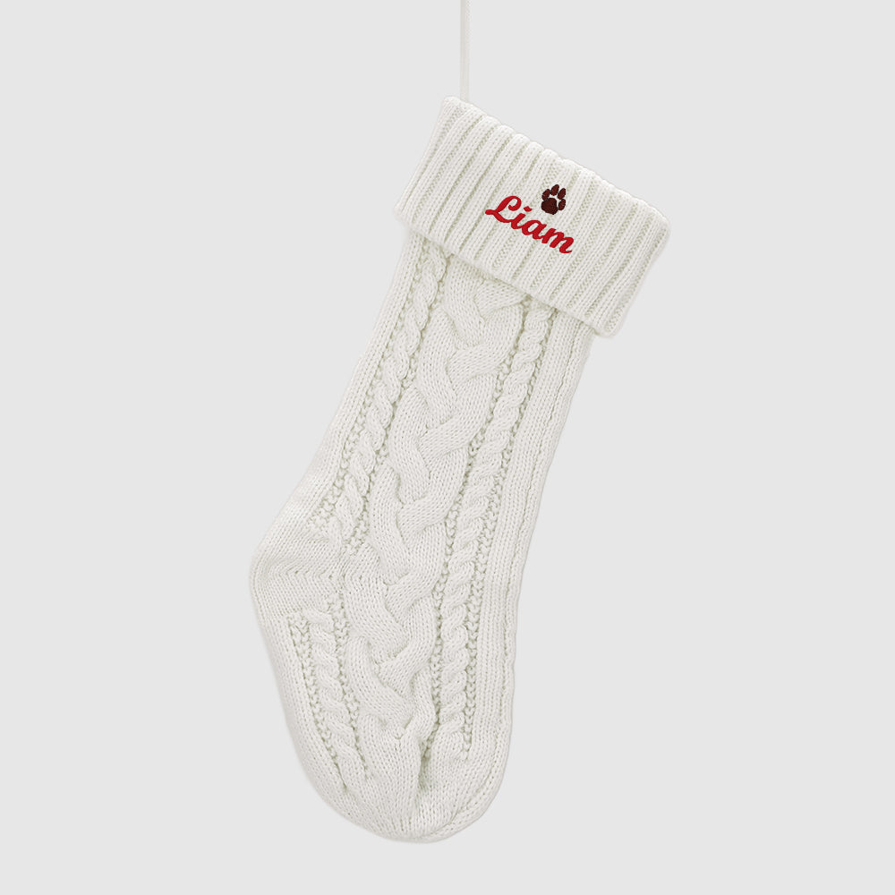 White Personalized Embroidered Name Cable Knit Christmas Stocking with Holiday Decor on the white background