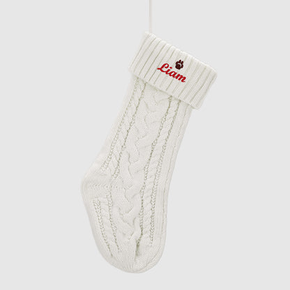 White Personalized Embroidered Name Cable Knit Christmas Stocking with Holiday Decor on the white background