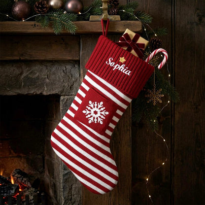 Red Personalized Embroidered Name Striped Christmas Stocking with Holiday Decor handing on the fireplace