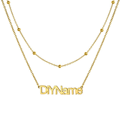 Custom Layered Name Necklace for Women on a white background