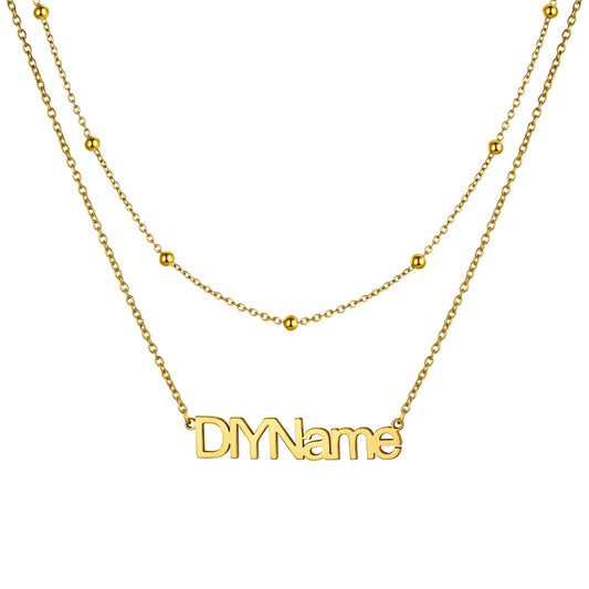 Custom Layered Name Necklace for Women on a white background