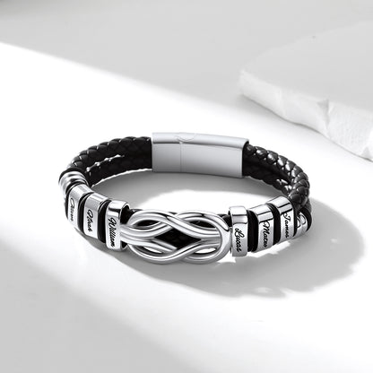 Custom Name leather bracelet with infinity symbol on a white background