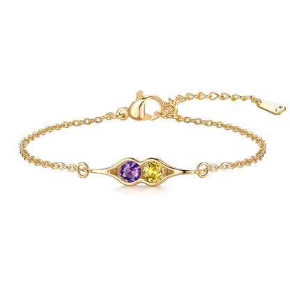 Gold 2 birthstones pea in pot bracelet with two gemstones on a white background