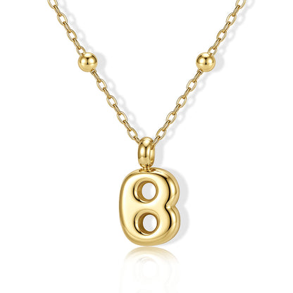 Gold Bubble Initial B Necklace for Women on a white background