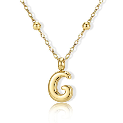 Gold Bubble Initial G Necklace for Women on a white background